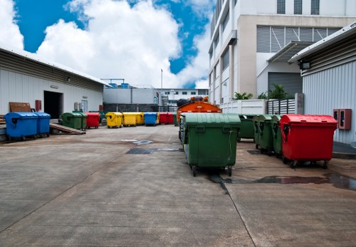 Workers managing building debris on a construction site